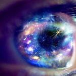 Image of beautiful blue eye with stars and galaxies embedded in it