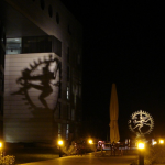 Shadow of a brass statue of Brahman.