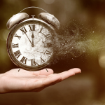 A disintegrating clock hovering over a hand