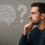 A thoughtful man contemplating perception and reality, symbolizing the unity of observer and observed in conscious experience